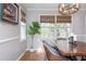 Charming dining room featuring modern light fixture and hardwood floors at 2733 Eagle Ridge Rd, Marietta, GA 30062