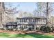 A two-story home with a well-manicured front lawn and mature trees at 2733 Eagle Ridge Rd, Marietta, GA 30062