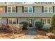 Traditional home featuring a brick walkway leading to the front door, surrounded by manicured bushes at 2733 Eagle Ridge Rd, Marietta, GA 30062