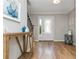 Bright foyer features hardwood floors, a staircase, and a view of the front door with sidelights at 2733 Eagle Ridge Rd, Marietta, GA 30062