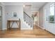 Welcoming foyer features hardwood floors, a staircase, and a bright, airy feel with natural light at 2733 Eagle Ridge Rd, Marietta, GA 30062