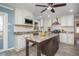 Bright kitchen featuring a center island, granite countertops, stainless steel appliances, and hardwood floors at 2733 Eagle Ridge Rd, Marietta, GA 30062