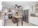 Bright kitchen featuring a center island, granite countertops, stainless steel appliances, and hardwood floors at 2733 Eagle Ridge Rd, Marietta, GA 30062