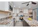 Bright kitchen featuring a center island, granite countertops, stainless steel appliances, and hardwood floors at 2733 Eagle Ridge Rd, Marietta, GA 30062