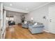 Open living room featuring hardwood floors, a fireplace, and plenty of natural light at 2733 Eagle Ridge Rd, Marietta, GA 30062