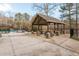 Community pavilion with picnic tables and stone columns provides a relaxing spot by the pool at 2733 Eagle Ridge Rd, Marietta, GA 30062