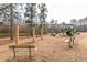 A view of the playground with swings, slides, and benches creating a fun, relaxing space at 2733 Eagle Ridge Rd, Marietta, GA 30062