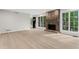Large living room features a stone fireplace and bright windows at 4720 Norman Nw Dr, Kennesaw, GA 30144