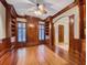 Wood-paneled office with built-in bookshelves and hardwood floors at 973 Peachtree Battle Ave, Atlanta, GA 30327