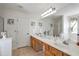 Well-lit bathroom featuring a double vanity, garden tub, and separate shower at 3641 Devenwood Way, Buford, GA 30519