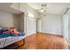 Bedroom with bright walls, ceiling fan, and nice closet space, offering a calm retreat at 1291 Marcelle Heights Pl, Norcross, GA 30093