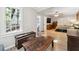 Bright bedroom with wood floors seamlessly connects to a bathroom and living room at 1291 Marcelle Heights Pl, Norcross, GA 30093