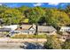 Aerial view of residential homes surrounded by trees and a restaurant at 1640 Lakewood Se Ave, Atlanta, GA 30315