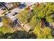 Aerial view displays a home surrounded by dense trees, enhancing privacy and natural beauty in this residential area at 1640 Lakewood Se Ave, Atlanta, GA 30315
