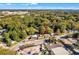 The aerial view shows the property amongst other buildings and tree cover at 1640 Lakewood Se Ave, Atlanta, GA 30315