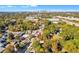 Aerial view shows a property in a wooded area with the city skyline in the distance at 1640 Lakewood Se Ave, Atlanta, GA 30315