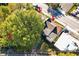 A high angle shot displays a property with a mature tree lined yard near a road, offering both privacy and accessibility at 1640 Lakewood Se Ave, Atlanta, GA 30315