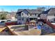 Aerial view of the home's backyard with a gazebo, deck, and fenced yard at 2640 Paddock Point Pl, Dacula, GA 30019