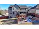 Aerial view showcasing the home's backyard featuring a gazebo, deck, and fenced perimeter at 2640 Paddock Point Pl, Dacula, GA 30019