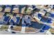 Aerial shot featuring a well-maintained home, spacious driveway, and landscaped surroundings in a residential area at 2640 Paddock Point Pl, Dacula, GA 30019