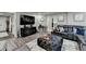 Finished basement offers a generous seating area, stylish décor, and an open layout at 2640 Paddock Point Pl, Dacula, GA 30019