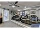Finished basement featuring comfortable seating, built-ins, and decorative items to make you feel right at home at 2640 Paddock Point Pl, Dacula, GA 30019