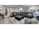 Finished basement providing a roomy seating area and elegant décor for comfortable living and relaxation at 2640 Paddock Point Pl, Dacula, GA 30019