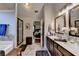 Relaxing bathroom with walk-in shower, double vanity and access to bedroom and closet at 2640 Paddock Point Pl, Dacula, GA 30019