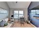 Bedroom with a study area featuring a desk, TV, guitar and neutral carpeting at 2640 Paddock Point Pl, Dacula, GA 30019