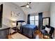 Bedroom with hardwood flooring, a large window, and elegant decor, including a mirrored nightstand at 2640 Paddock Point Pl, Dacula, GA 30019