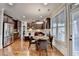 Eat-in kitchen with stainless steel appliances, a kitchen island and lots of dark cabinets at 2640 Paddock Point Pl, Dacula, GA 30019