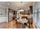 Gourmet kitchen with stainless steel appliances, an island and a dining area at 2640 Paddock Point Pl, Dacula, GA 30019