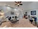 Beautiful living room with vaulted ceilings, neutral color palette and stylish decor at 2640 Paddock Point Pl, Dacula, GA 30019