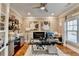 Functional home office with ample natural light and built-in shelving at 2640 Paddock Point Pl, Dacula, GA 30019
