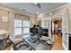 Well-lit office with dual monitors, dark furnishings, and a comfortable workspace at 2640 Paddock Point Pl, Dacula, GA 30019