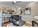 Bright home office with large windows, hardwood floors, and neutral decor at 2640 Paddock Point Pl, Dacula, GA 30019
