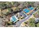 Aerial view showcasing community amenities including a pool, tennis courts, and well-manicured landscaping at 350 Newcastle Dr, Alpharetta, GA 30009