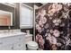 Well-appointed bathroom with floral shower curtain, modern vanity, and neutral color scheme at 350 Newcastle Dr, Alpharetta, GA 30009