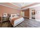 Charming bedroom featuring neutral decor, modern furniture, and ample natural light at 350 Newcastle Dr, Alpharetta, GA 30009