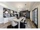 Modern dining room with contrasting colors, chic lighting, and elegant décor at 350 Newcastle Dr, Alpharetta, GA 30009