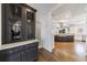 Stylish kitchen with custom cabinetry, modern appliances, and hardwood floors at 350 Newcastle Dr, Alpharetta, GA 30009