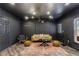 Cozy living room with modern chandelier, comfortable seating, and area rug at 350 Newcastle Dr, Alpharetta, GA 30009