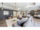 Open concept living room featuring stylish lighting, modern décor, and wood-look flooring at 350 Newcastle Dr, Alpharetta, GA 30009