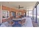 Covered patio with brick accents, ceiling fans and backyard views at 350 Newcastle Dr, Alpharetta, GA 30009