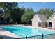Sparkling swimming pool with comfortable lounge area, perfect for relaxation and recreation at 350 Newcastle Dr, Alpharetta, GA 30009