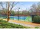 Well-maintained tennis courts surrounded by lush greenery, providing a scenic and active lifestyle at 350 Newcastle Dr, Alpharetta, GA 30009