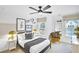 Bright and fun bedroom with decorative wall art, a cozy reading nook, and lots of natural light at 5765 Tillman Way, Powder Springs, GA 30127