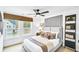 Inviting bedroom with soft natural light, minimalist decor, and stylish furnishings for a comfortable retreat at 5765 Tillman Way, Powder Springs, GA 30127