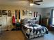 Bedroom with ceiling fan, quilt, and decor at 101 Waters Edge Pkwy, Temple, GA 30179