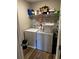 Laundry room featuring washer, dryer and overhead wire shelving at 101 Waters Edge Pkwy, Temple, GA 30179